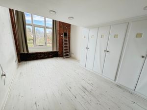 Bedroom One- click for photo gallery